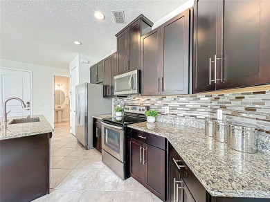 Under contract-accepting backup offers. Beautiful END-UNIT on Eagle Creek Golf Club in Florida - for sale on GolfHomes.com, golf home, golf lot