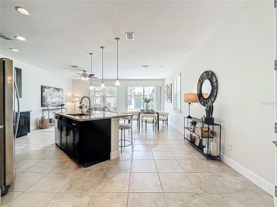 Under contract-accepting backup offers. Beautiful END-UNIT on Eagle Creek Golf Club in Florida - for sale on GolfHomes.com, golf home, golf lot