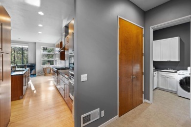 This Mid-Century Modern masterpiece is located near Lake on Grand Haven Golf Club in Michigan - for sale on GolfHomes.com, golf home, golf lot