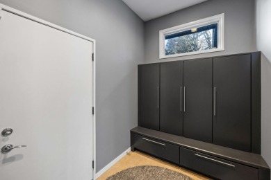 This Mid-Century Modern masterpiece is located near Lake on Grand Haven Golf Club in Michigan - for sale on GolfHomes.com, golf home, golf lot