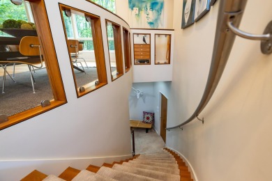 This Mid-Century Modern masterpiece is located near Lake on Grand Haven Golf Club in Michigan - for sale on GolfHomes.com, golf home, golf lot