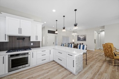 Situated in the heart of Sun City Summerlin, above Eagle Crest on Highland Falls Golf Club in Nevada - for sale on GolfHomes.com, golf home, golf lot