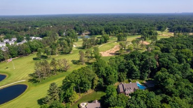 This Mid-Century Modern masterpiece is located near Lake on Grand Haven Golf Club in Michigan - for sale on GolfHomes.com, golf home, golf lot