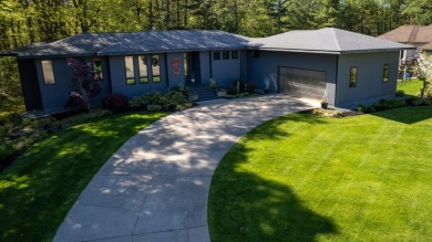 This Mid-Century Modern masterpiece is located near Lake on Grand Haven Golf Club in Michigan - for sale on GolfHomes.com, golf home, golf lot