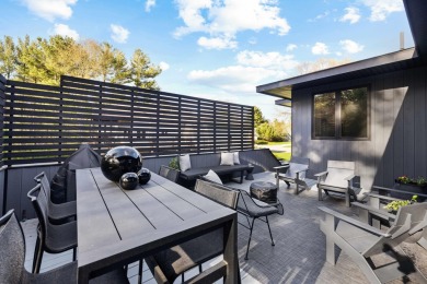 This Mid-Century Modern masterpiece is located near Lake on Grand Haven Golf Club in Michigan - for sale on GolfHomes.com, golf home, golf lot