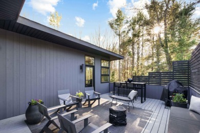 This Mid-Century Modern masterpiece is located near Lake on Grand Haven Golf Club in Michigan - for sale on GolfHomes.com, golf home, golf lot
