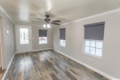 This is a very nice home on a corner lot. Many upgrades shows on Tidewater Golf Club and Plantation in South Carolina - for sale on GolfHomes.com, golf home, golf lot