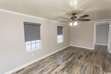 This is a very nice home on a corner lot. Many upgrades shows on Tidewater Golf Club and Plantation in South Carolina - for sale on GolfHomes.com, golf home, golf lot