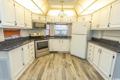 This is a very nice home on a corner lot. Many upgrades shows on Tidewater Golf Club and Plantation in South Carolina - for sale on GolfHomes.com, golf home, golf lot