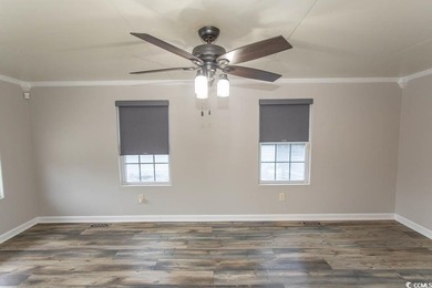 This is a very nice home on a corner lot. Many upgrades shows on Tidewater Golf Club and Plantation in South Carolina - for sale on GolfHomes.com, golf home, golf lot