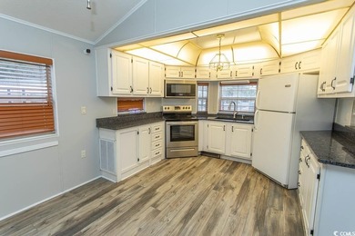 This is a very nice home on a corner lot. Many upgrades shows on Tidewater Golf Club and Plantation in South Carolina - for sale on GolfHomes.com, golf home, golf lot