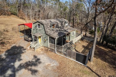 Nestled in the heart of the scenic Pineywoods, this charming on Pine Dunes Golf Course in Texas - for sale on GolfHomes.com, golf home, golf lot