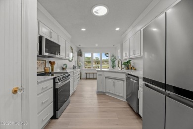 Nestled in a serene, nature-filled environment, this beautifully on Harbour Point Golf Club in North Carolina - for sale on GolfHomes.com, golf home, golf lot
