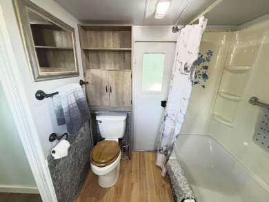FULLY FURNISHED WITH GOLF CART. Beautiful, remodeled Camper on Lake Tansi Village Country Club in Tennessee - for sale on GolfHomes.com, golf home, golf lot