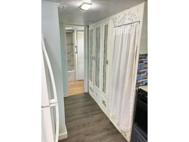 FULLY FURNISHED WITH GOLF CART. Beautiful, remodeled Camper on Lake Tansi Village Country Club in Tennessee - for sale on GolfHomes.com, golf home, golf lot