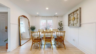 Nestled in a serene, nature-filled environment, this beautifully on Harbour Point Golf Club in North Carolina - for sale on GolfHomes.com, golf home, golf lot