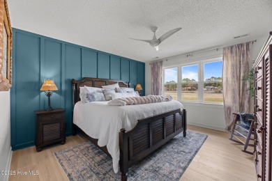 Nestled in a serene, nature-filled environment, this beautifully on Harbour Point Golf Club in North Carolina - for sale on GolfHomes.com, golf home, golf lot