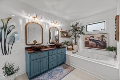 Nestled in a serene, nature-filled environment, this beautifully on Harbour Point Golf Club in North Carolina - for sale on GolfHomes.com, golf home, golf lot