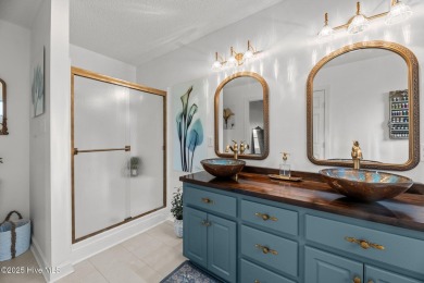 Nestled in a serene, nature-filled environment, this beautifully on Harbour Point Golf Club in North Carolina - for sale on GolfHomes.com, golf home, golf lot