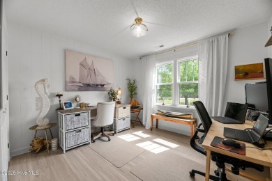 Nestled in a serene, nature-filled environment, this beautifully on Harbour Point Golf Club in North Carolina - for sale on GolfHomes.com, golf home, golf lot