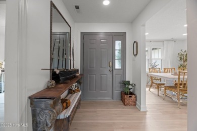 Nestled in a serene, nature-filled environment, this beautifully on Harbour Point Golf Club in North Carolina - for sale on GolfHomes.com, golf home, golf lot