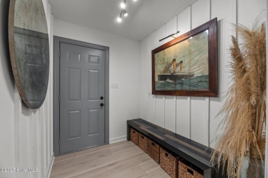 Nestled in a serene, nature-filled environment, this beautifully on Harbour Point Golf Club in North Carolina - for sale on GolfHomes.com, golf home, golf lot