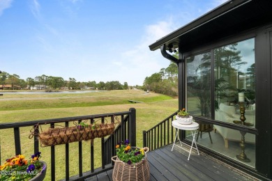 Nestled in a serene, nature-filled environment, this beautifully on Harbour Point Golf Club in North Carolina - for sale on GolfHomes.com, golf home, golf lot