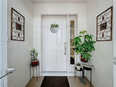 Walk into this modernized Canterbury model located in 55+ gated on Kings Ridge Golf Club in Florida - for sale on GolfHomes.com, golf home, golf lot