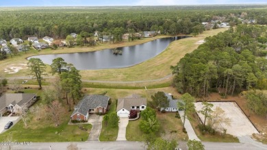 Nestled in a serene, nature-filled environment, this beautifully on Harbour Point Golf Club in North Carolina - for sale on GolfHomes.com, golf home, golf lot