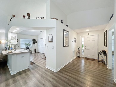 Walk into this modernized Canterbury model located in 55+ gated on Kings Ridge Golf Club in Florida - for sale on GolfHomes.com, golf home, golf lot