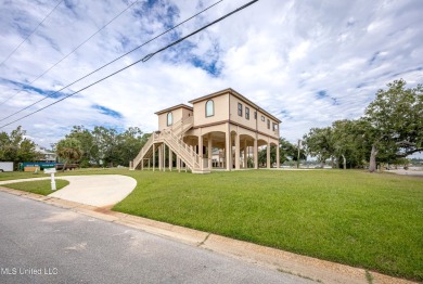 Experience the best of coastal living in this stunning 4 on Gulf Hills Golf Club in Mississippi - for sale on GolfHomes.com, golf home, golf lot