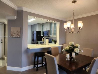 Welcome to this beautifully updated 2-Bed, 2-Baths unit in a on Sunrise Lakes Phase IV Golf Course in Florida - for sale on GolfHomes.com, golf home, golf lot