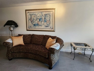 Welcome to this beautifully updated 2-Bed, 2-Baths unit in a on Sunrise Lakes Phase IV Golf Course in Florida - for sale on GolfHomes.com, golf home, golf lot