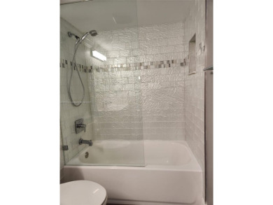 Welcome to this beautifully updated 2-Bed, 2-Baths unit in a on Sunrise Lakes Phase IV Golf Course in Florida - for sale on GolfHomes.com, golf home, golf lot