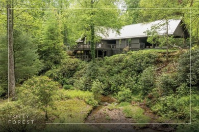 Discover this Holly Forest home in a one-of-a-kind setting with on Sapphire National Golf Club in North Carolina - for sale on GolfHomes.com, golf home, golf lot