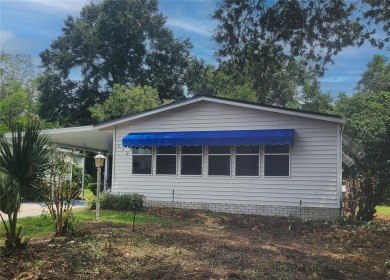 AFFORDABLE VILLAGES LIVING with NO BOND and NO CDD FEES! Move in on El Diablo Executive Golf Course in Florida - for sale on GolfHomes.com, golf home, golf lot