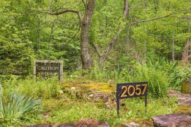 Discover this Holly Forest home in a one-of-a-kind setting with on Sapphire National Golf Club in North Carolina - for sale on GolfHomes.com, golf home, golf lot