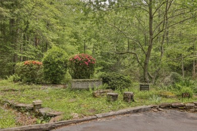 Discover this Holly Forest home in a one-of-a-kind setting with on Sapphire National Golf Club in North Carolina - for sale on GolfHomes.com, golf home, golf lot