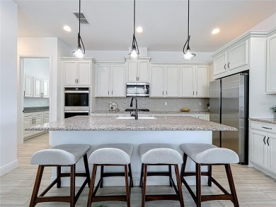 Elegant golf course home with designer upgrades located on the on Bella Collina Golf Club in Florida - for sale on GolfHomes.com, golf home, golf lot