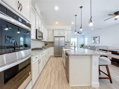 Elegant golf course home with designer upgrades located on the on Bella Collina Golf Club in Florida - for sale on GolfHomes.com, golf home, golf lot