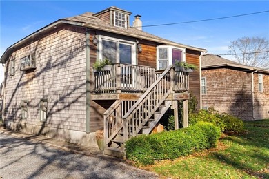 Welcome to 151 Ives Road, a bright and charming 3-bedroom home on Potowomut Golf Club in Rhode Island - for sale on GolfHomes.com, golf home, golf lot