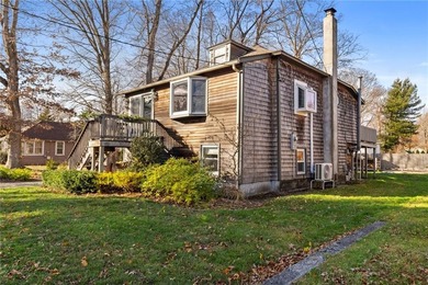 Welcome to 151 Ives Road, a bright and charming 3-bedroom home on Potowomut Golf Club in Rhode Island - for sale on GolfHomes.com, golf home, golf lot