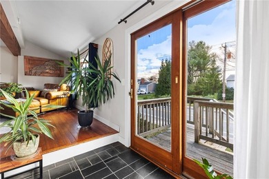 Welcome to 151 Ives Road, a bright and charming 3-bedroom home on Potowomut Golf Club in Rhode Island - for sale on GolfHomes.com, golf home, golf lot