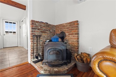 Welcome to 151 Ives Road, a bright and charming 3-bedroom home on Potowomut Golf Club in Rhode Island - for sale on GolfHomes.com, golf home, golf lot