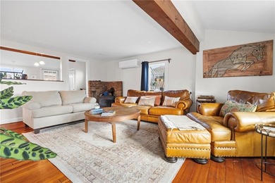 Welcome to 151 Ives Road, a bright and charming 3-bedroom home on Potowomut Golf Club in Rhode Island - for sale on GolfHomes.com, golf home, golf lot