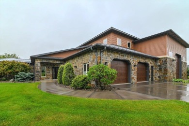 So many options with this home as it offers something for on Coachmans Golf Resort in Wisconsin - for sale on GolfHomes.com, golf home, golf lot