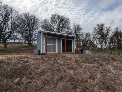 Discover the perfect blend of privacy, nature, and lake-area on The Club at Copper Valley Golf Course in California - for sale on GolfHomes.com, golf home, golf lot