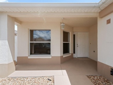 Welcome to a RARE courtyard villa with an OVERSIZED LOT in the on The Links of Spruce Creek in Florida - for sale on GolfHomes.com, golf home, golf lot