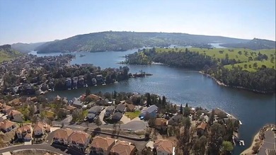 Discover the perfect blend of privacy, nature, and lake-area on The Club at Copper Valley Golf Course in California - for sale on GolfHomes.com, golf home, golf lot