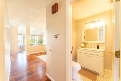 Experience relaxed, resort-style living in this beautifully on Louisquisset Golf Club in Rhode Island - for sale on GolfHomes.com, golf home, golf lot